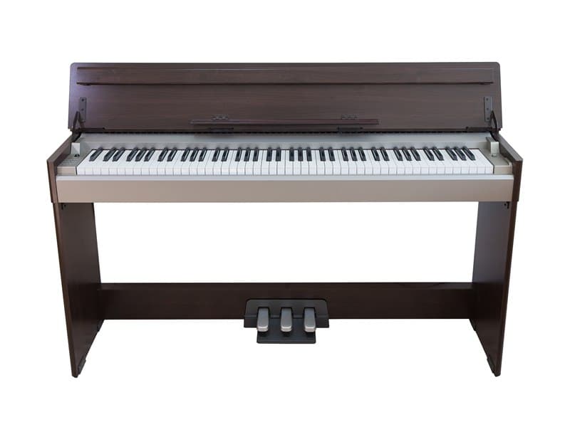 A dark wood digital piano on a slim stand, with its lid open, a full keyboard and three pedals.